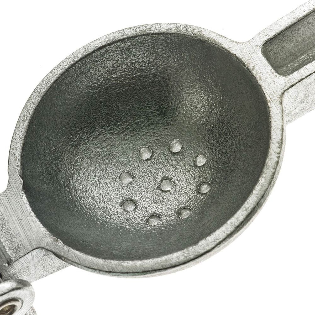 Close-up overhead view of the Barfly M37023 cast aluminum juicer bowl showing perforated drainage holes on a white background