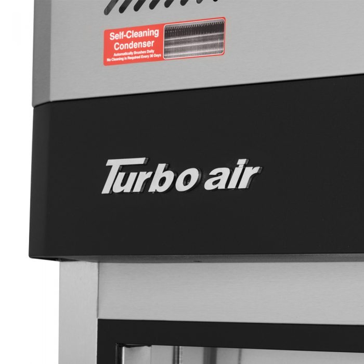 Close-up of Turbo Air self-cleaning condenser label on top mount section