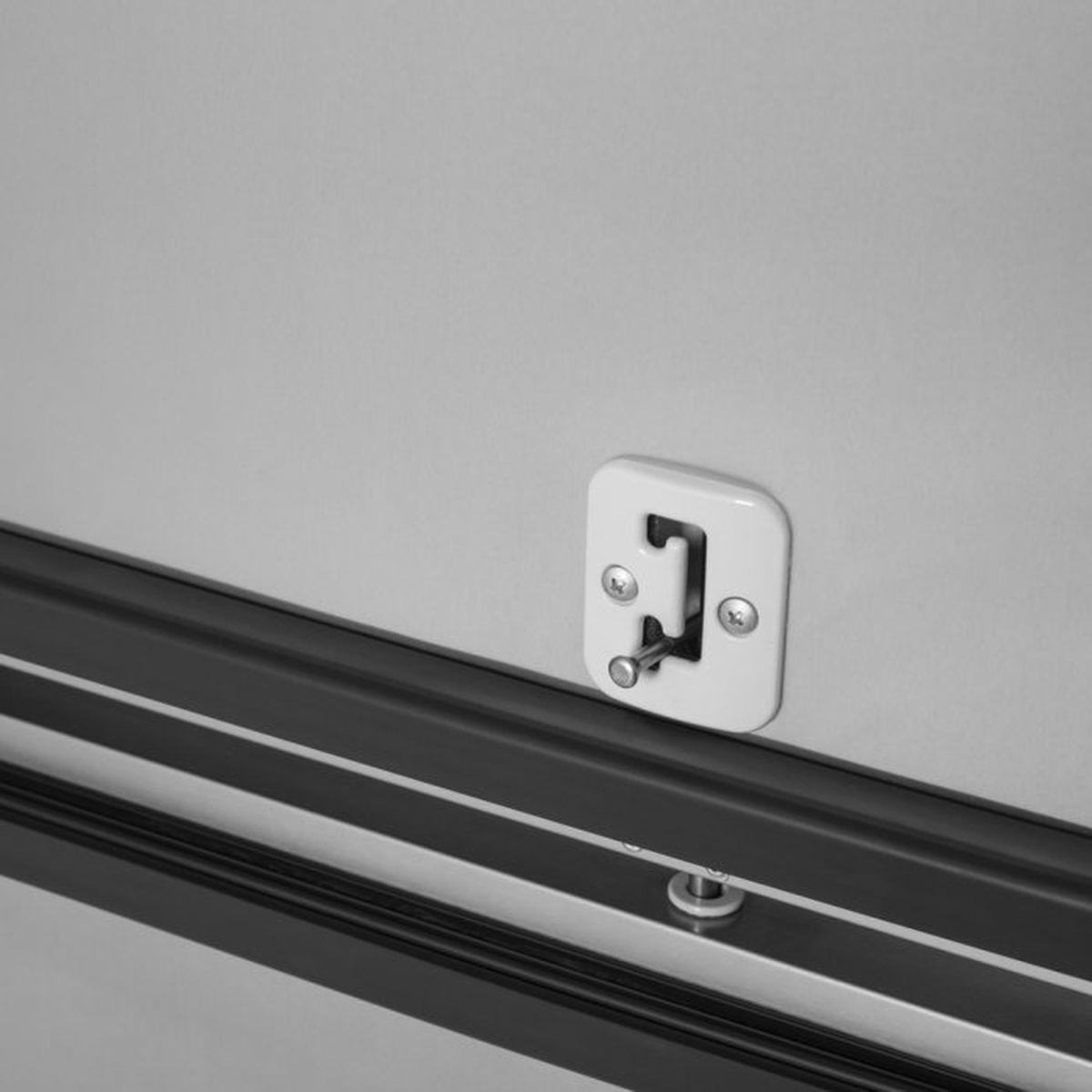 Close-up of Turbo Air reach-in refrigerator door lock hardware