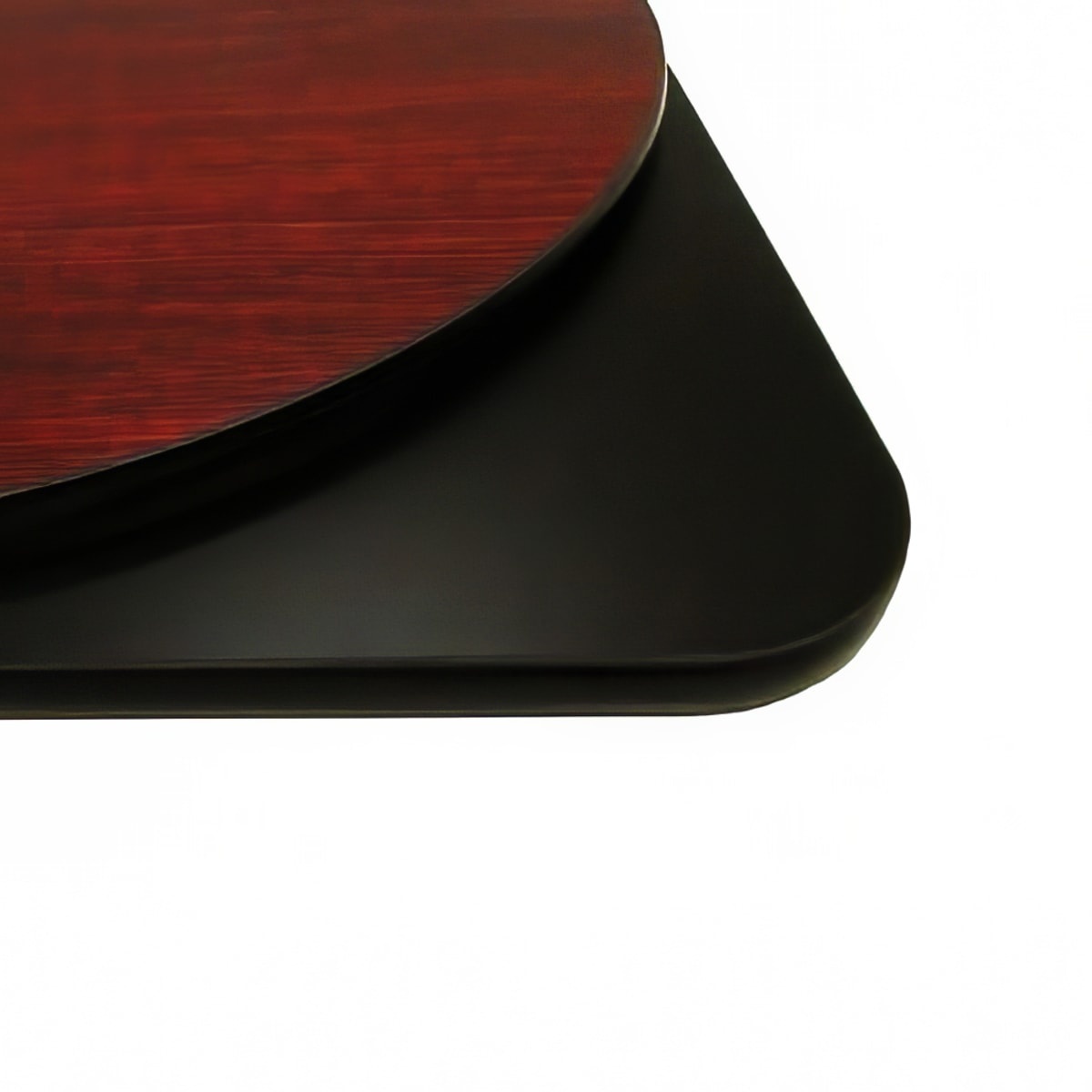 Oak Street MB24R 24-inch round reversible melamine table top showing mahogany surface resting on black surface with T-mold rubber edge detail