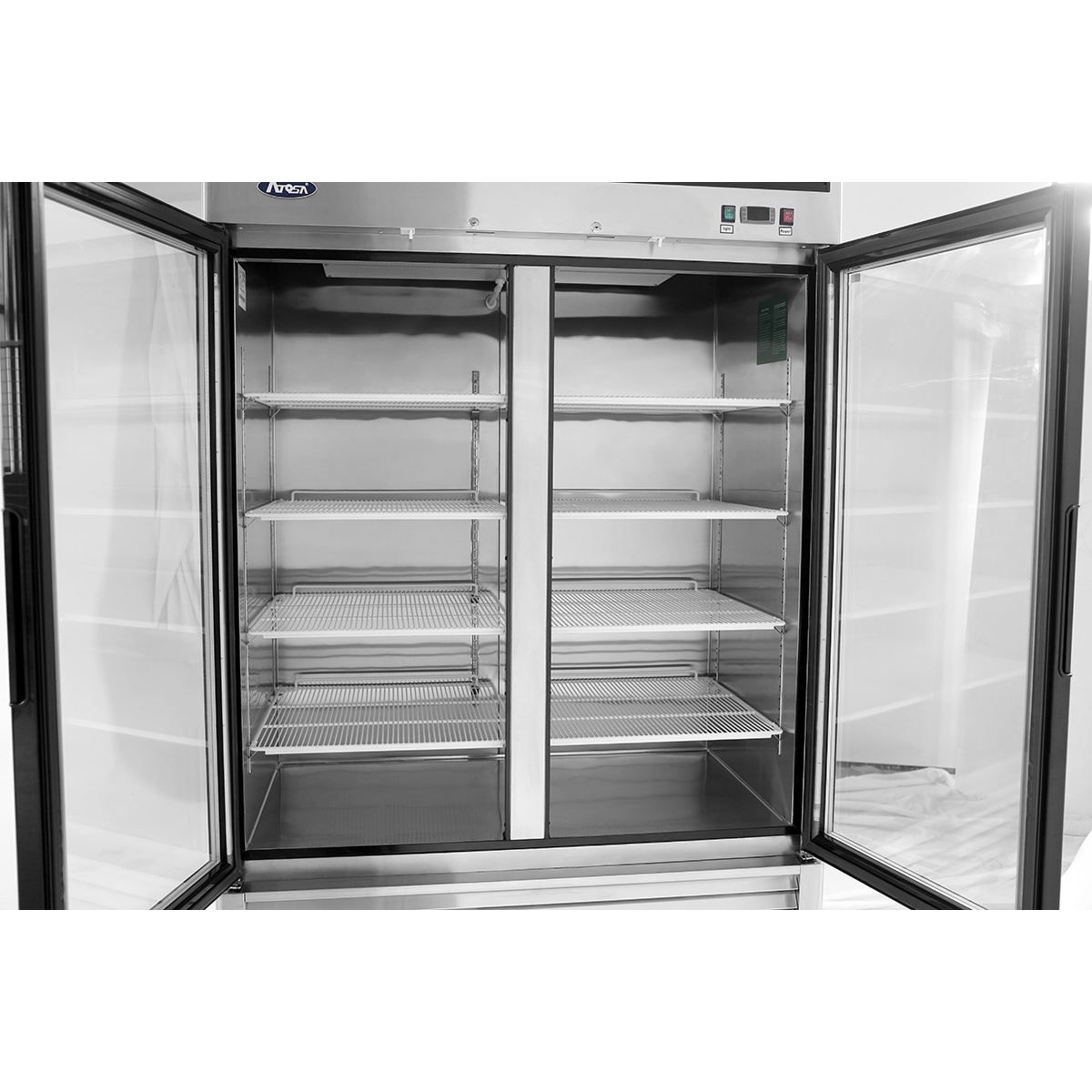 Interior view of Atosa MCF8703ES freezer with adjustable wire shelves