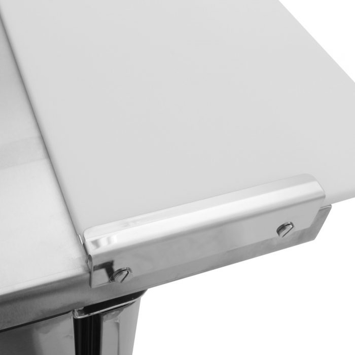 Close-up of prep table cutting board corner and mounting hardware