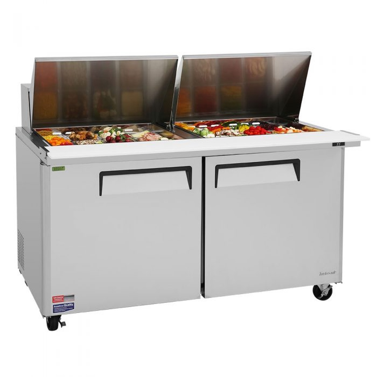 Angled view of Turbo Air MST-60-24-N refrigerated prep table showing stainless exterior and pan covers