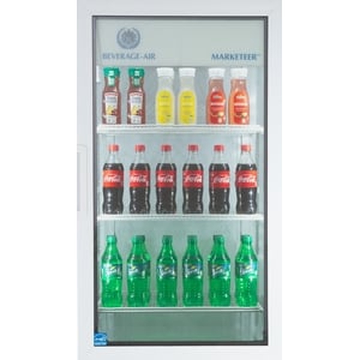 Beverage-Air MT10-1W merchandiser loaded with assorted chilled bottled beverages on three interior shelves