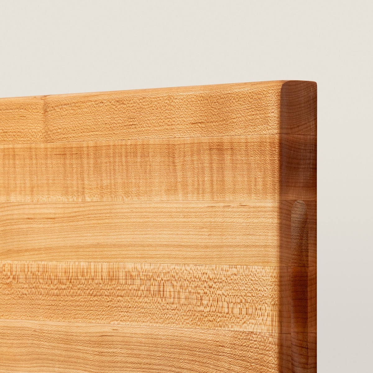 Close-up detail of the edge-grain construction and corner of the John Boos R01 maple cutting board