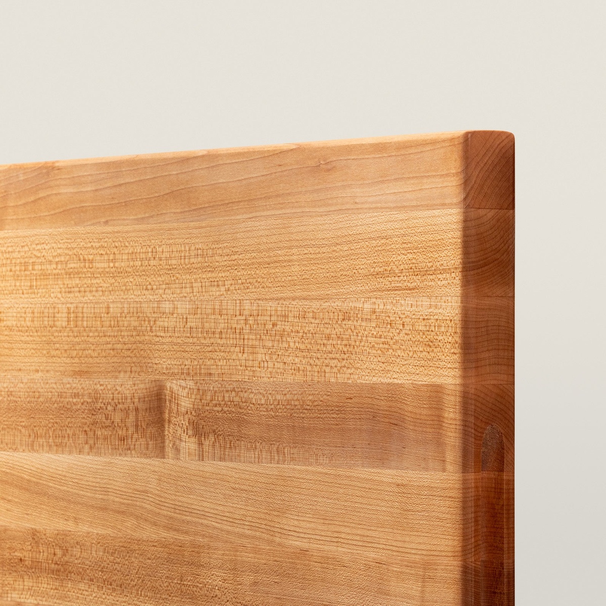 Close-up detail of John Boos R02 edge-grain maple construction and recessed finger grip