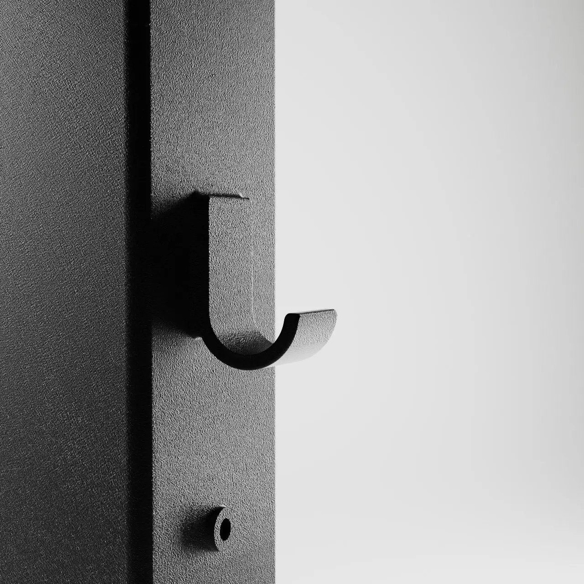 Integrated metal hook on the table base column