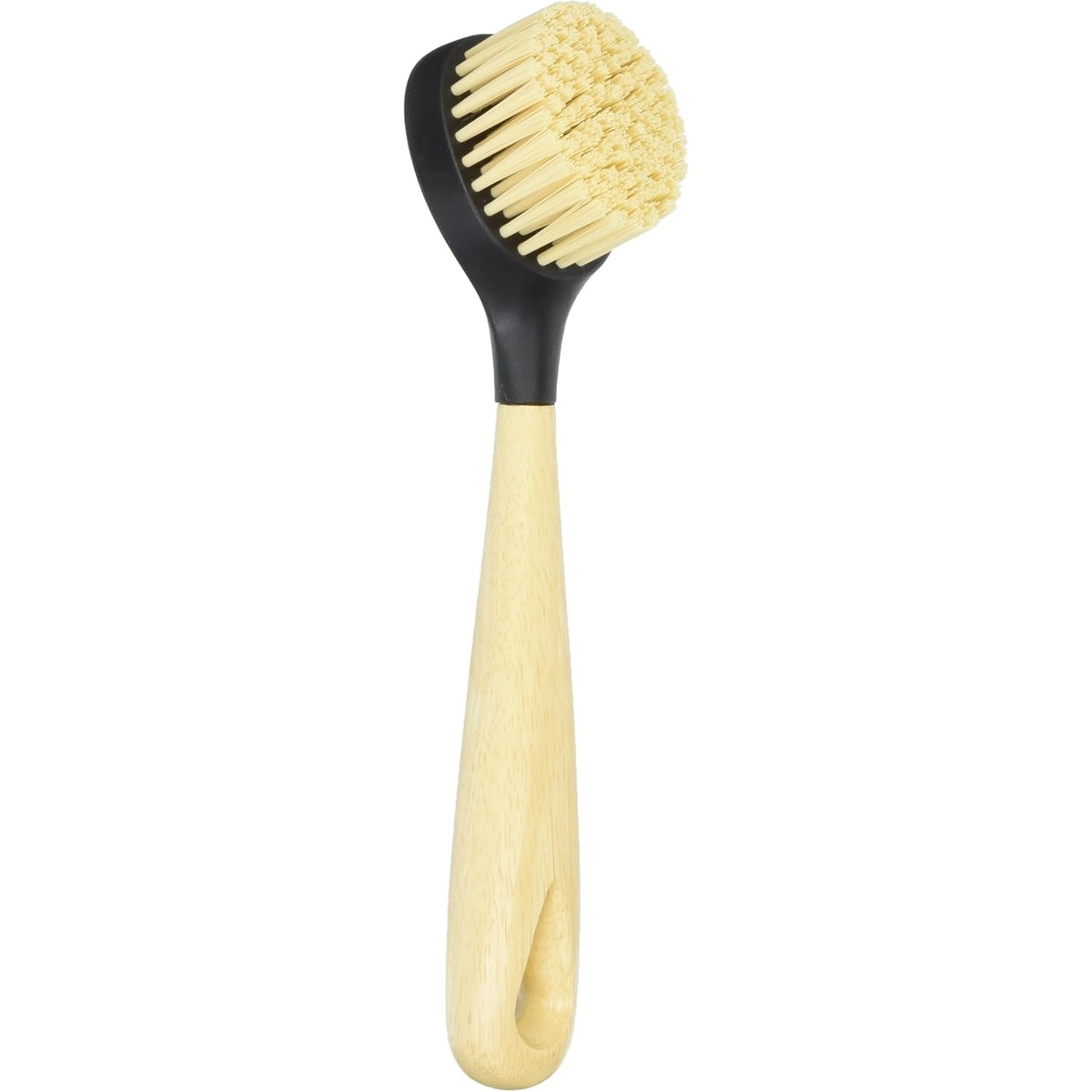 Lodge cast iron scrub brush showing cream-colored nylon bristles and natural wood handle with black plastic head