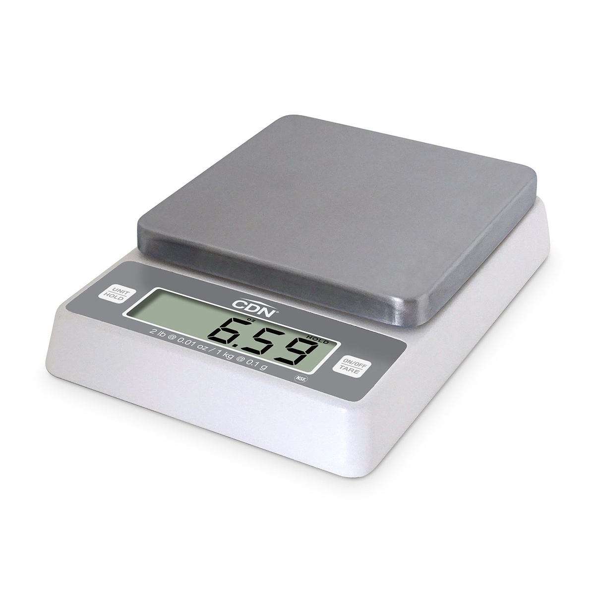 CDN SD0204 digital precision scale front three-quarter view showing stainless steel platform, LCD display reading 6.59, UNIT/HOLD and ON/OFF TARE buttons on white ABS housing