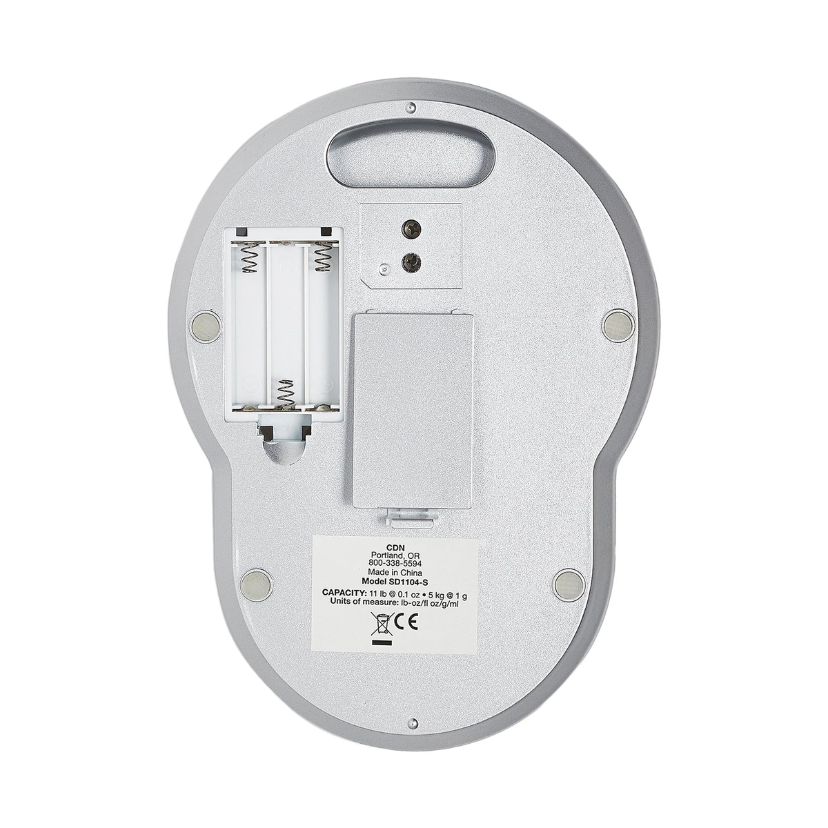 Bottom view of CDN digital scale showing battery compartment with three AAA battery slots, non-slip feet, and hanging hook cutout