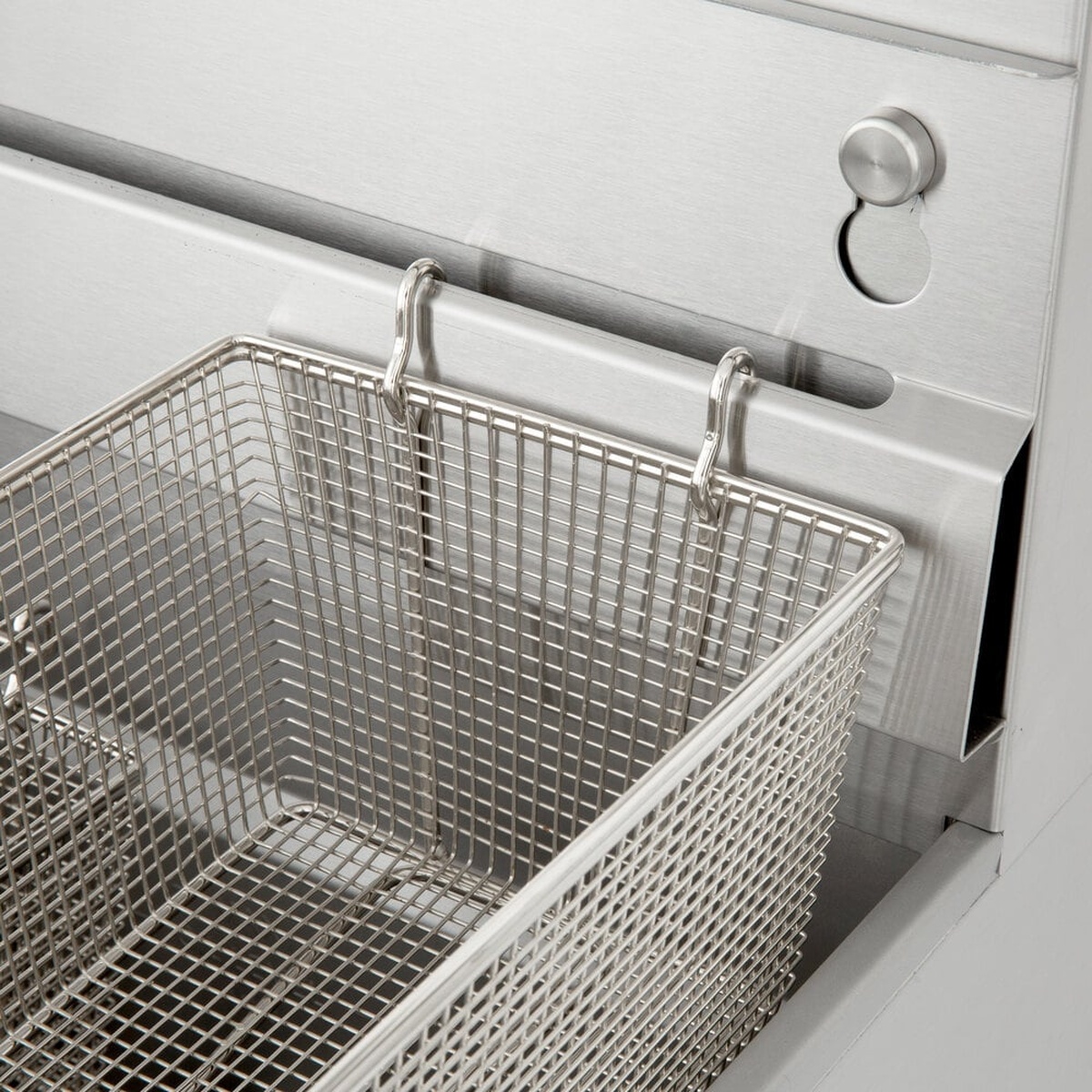 Fry basket resting on the removable basket hanger