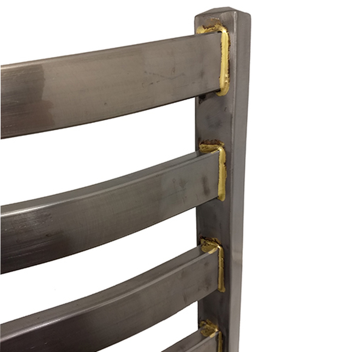 Close-up of ladderback barstool backrest showing clear coat metal finish and brass welds