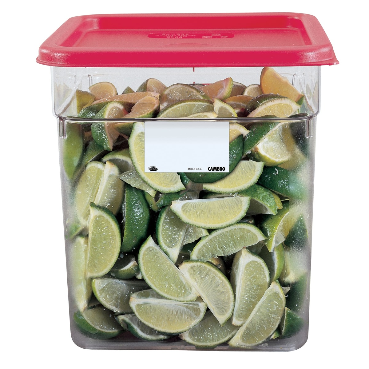Cambro StoreSafe food rotation label applied to a clear food storage container filled with lime wedges