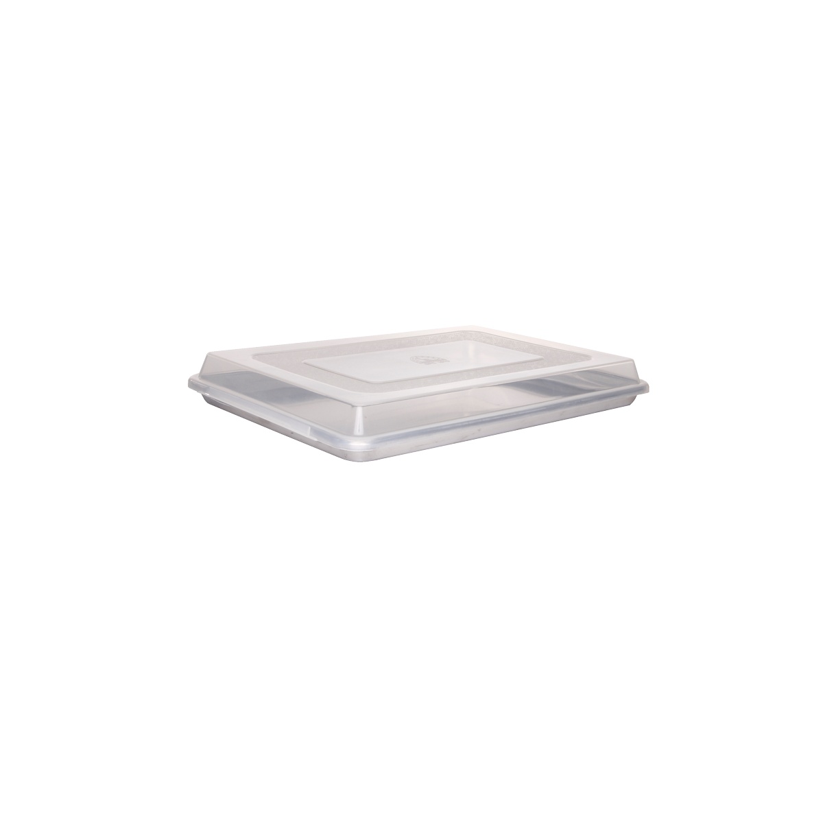 Clear snap-on plastic cover placed on a quarter-size aluminum sheet pan, shown from a slight angle