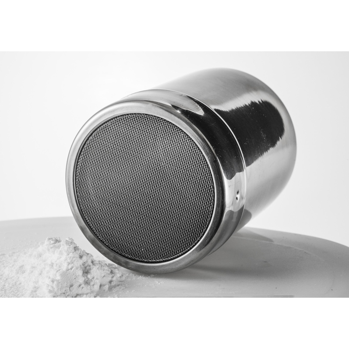 Winco SSD-10 stainless steel powdered sugar dispenser tipped on its side showing fine mesh top with powdered sugar
