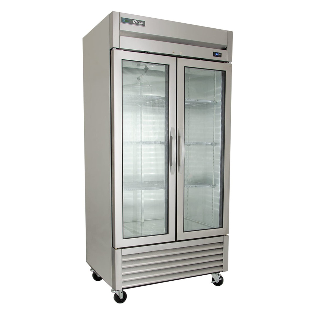 Angled view of True two-door glass reach-in refrigerator showing bottom front grille and casters