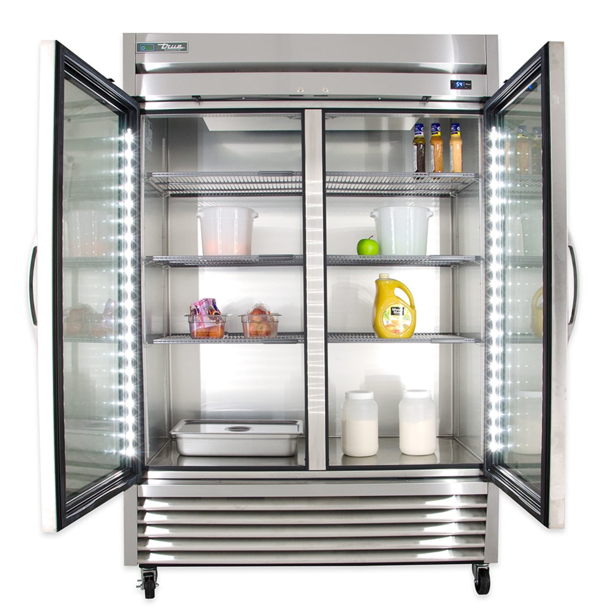 Back view of the refrigerator showing the bottom-mounted condensing unit area