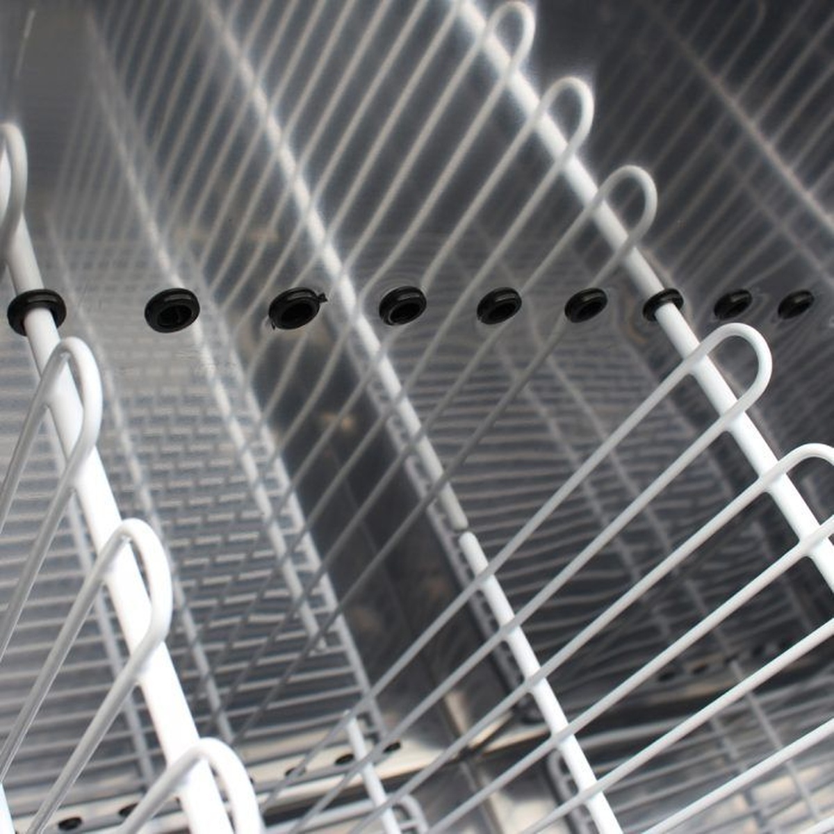 Interior bottle cooler storage with coated dividers