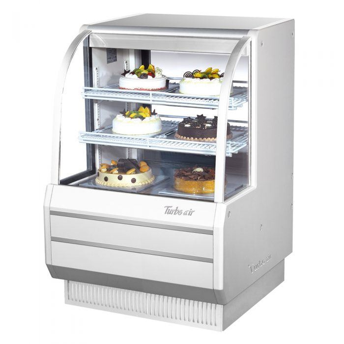 Turbo Air TCGB-36-W(B)-N curved glass refrigerated bakery display case in white finish showing cakes and desserts on wire shelves