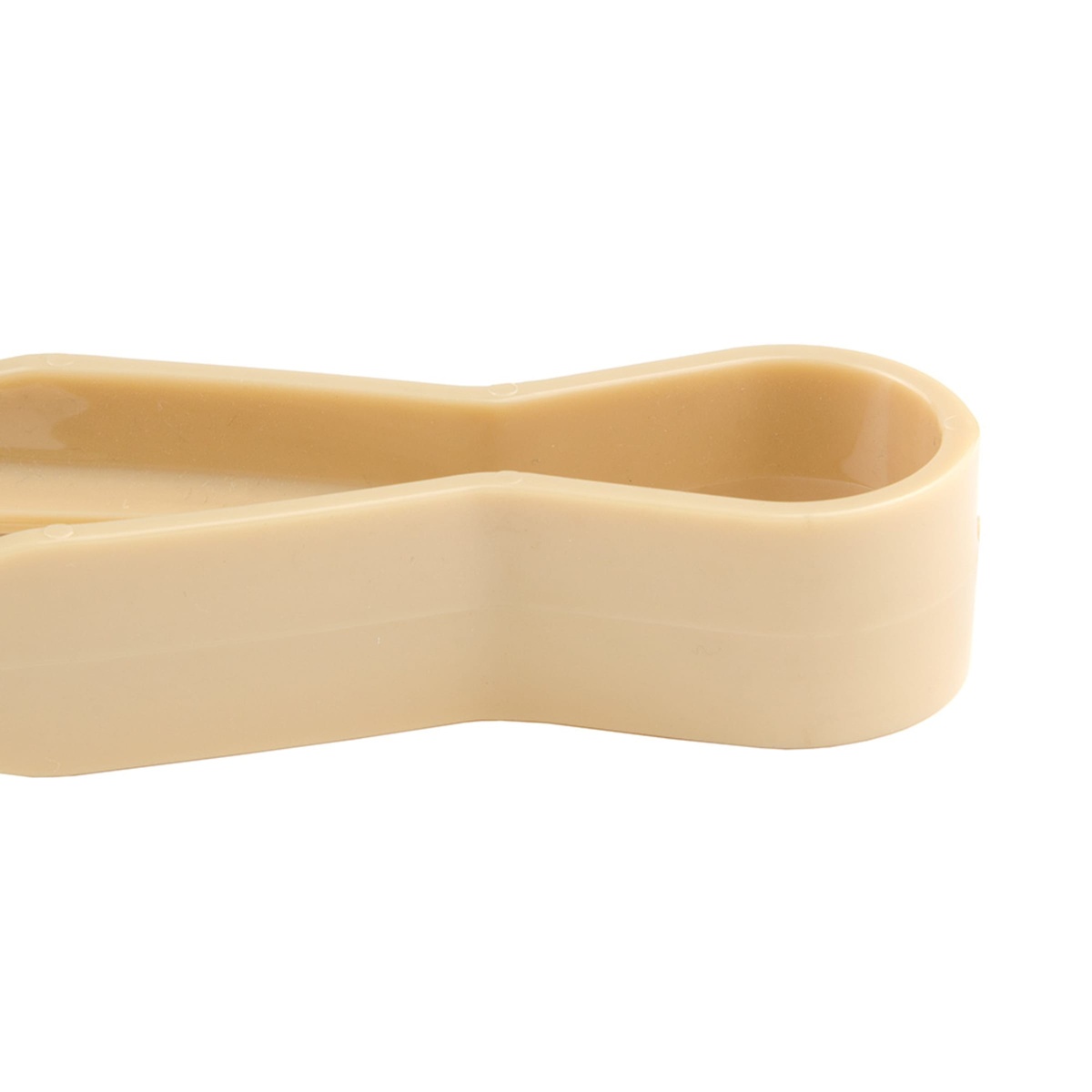 Close-up of the spring pivot area on the Cambro TG9133 beige serving tongs showing smooth construction