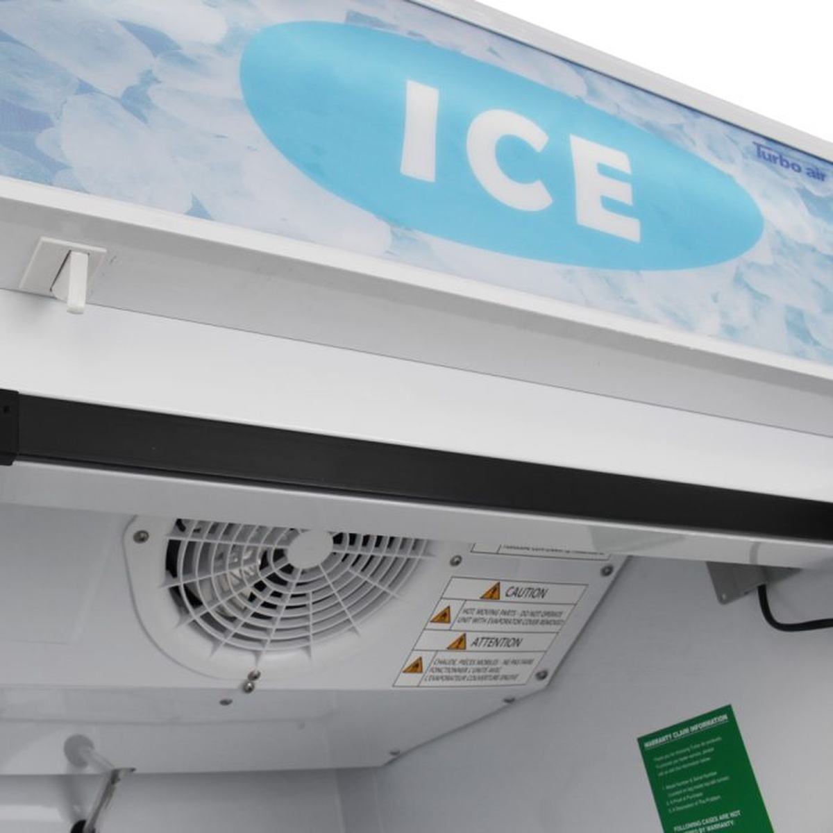 Interior top view of Turbo Air ice merchandiser showing evaporator fan and canopy area