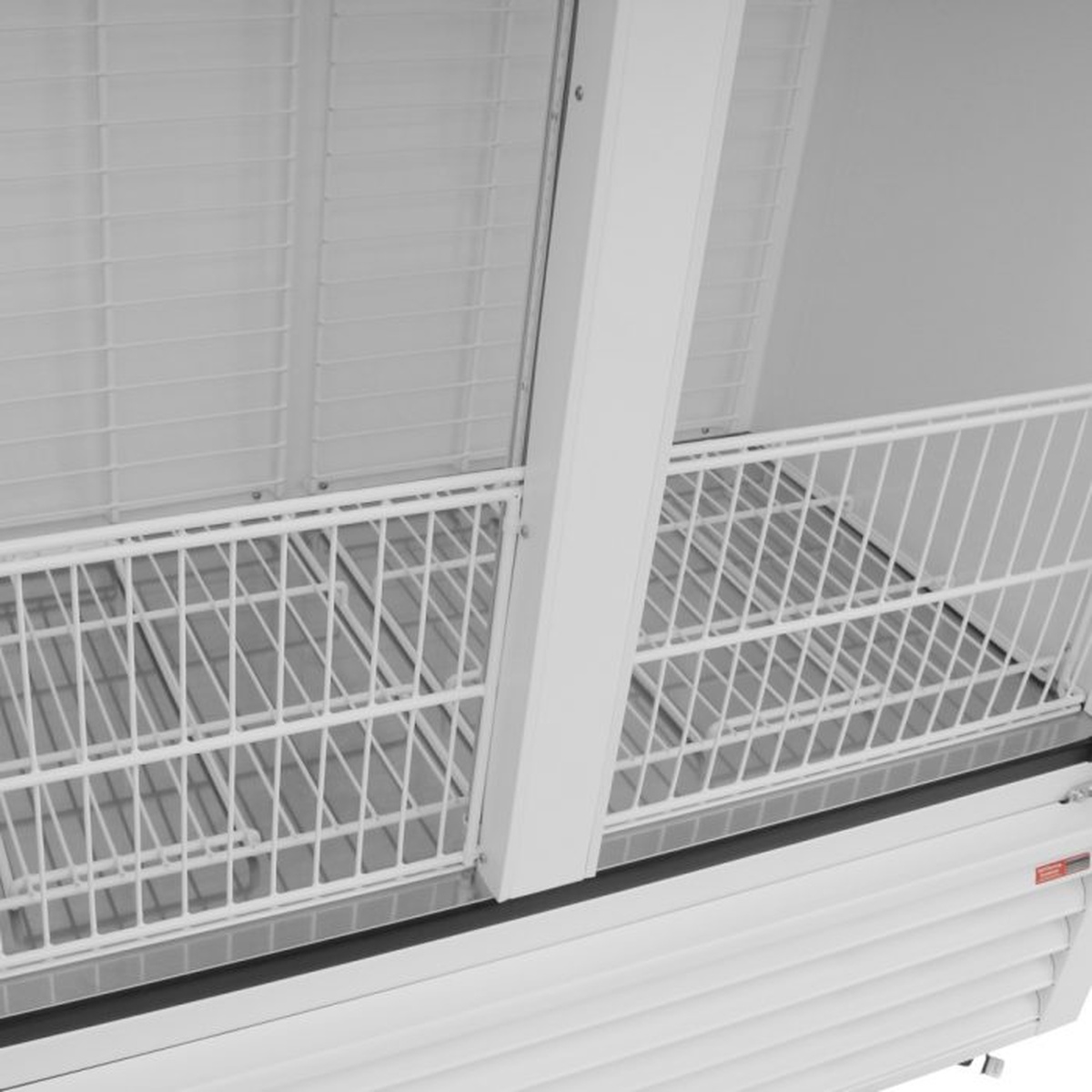Interior close-up of Turbo Air TGIM-49W-N wire shelves and lower basket area
