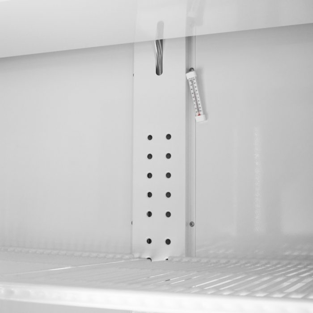 Interior wall and shelf support rail inside the Turbo Air merchandiser refrigerator