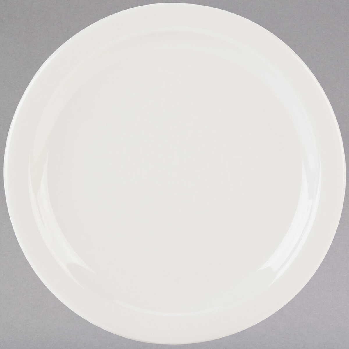 Tuxton TNR-008 9-inch eggshell narrow rim china plate, top-down view showing polished round surface
