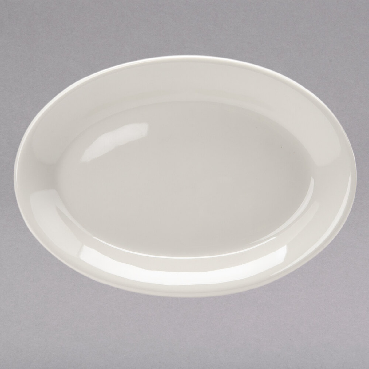 Tuxton TRE-026 oval china platter in American white eggshell finish with wide rim and rolled edge