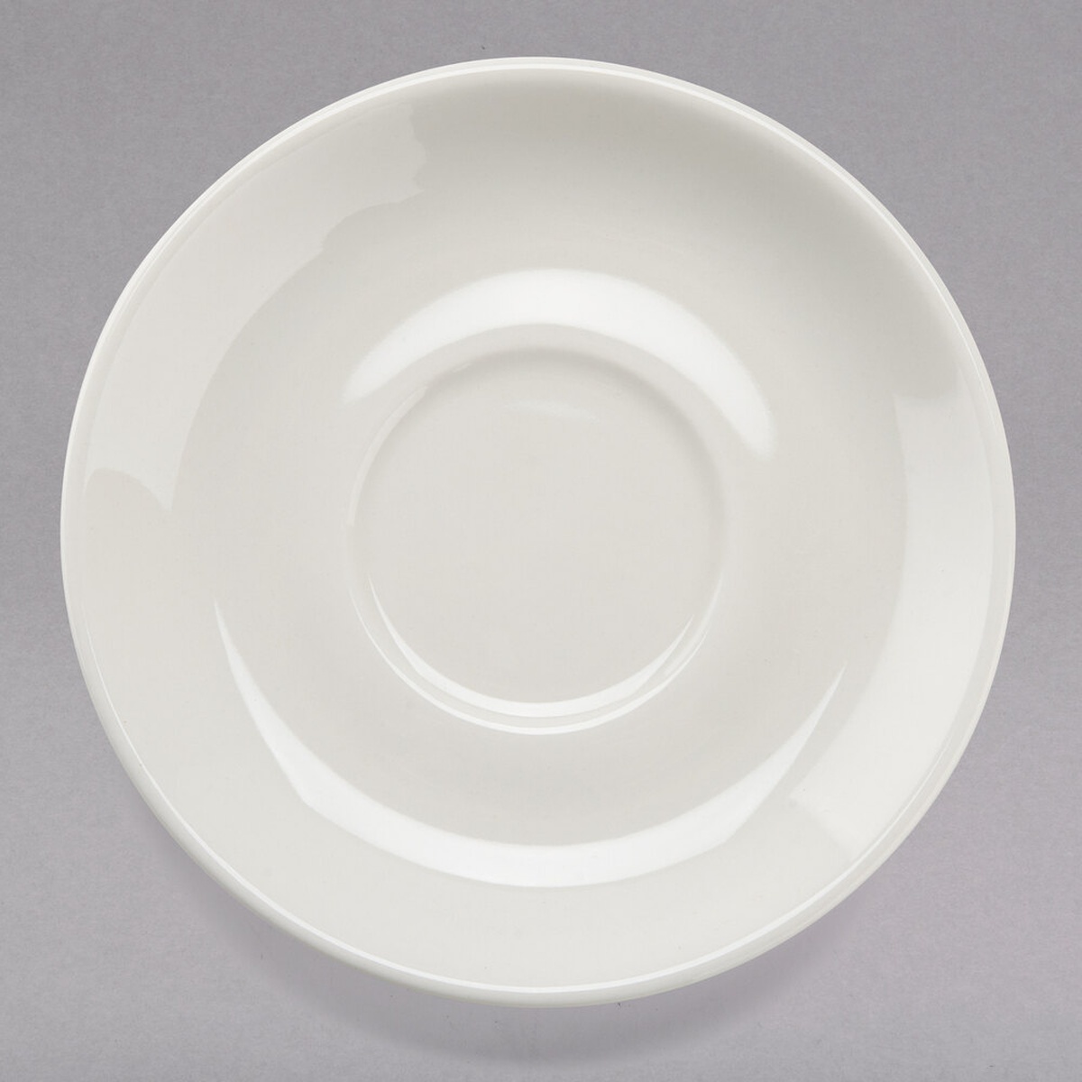 Tuxton TRE-029 American White eggshell wide rim rolled edge espresso saucer, top-down view