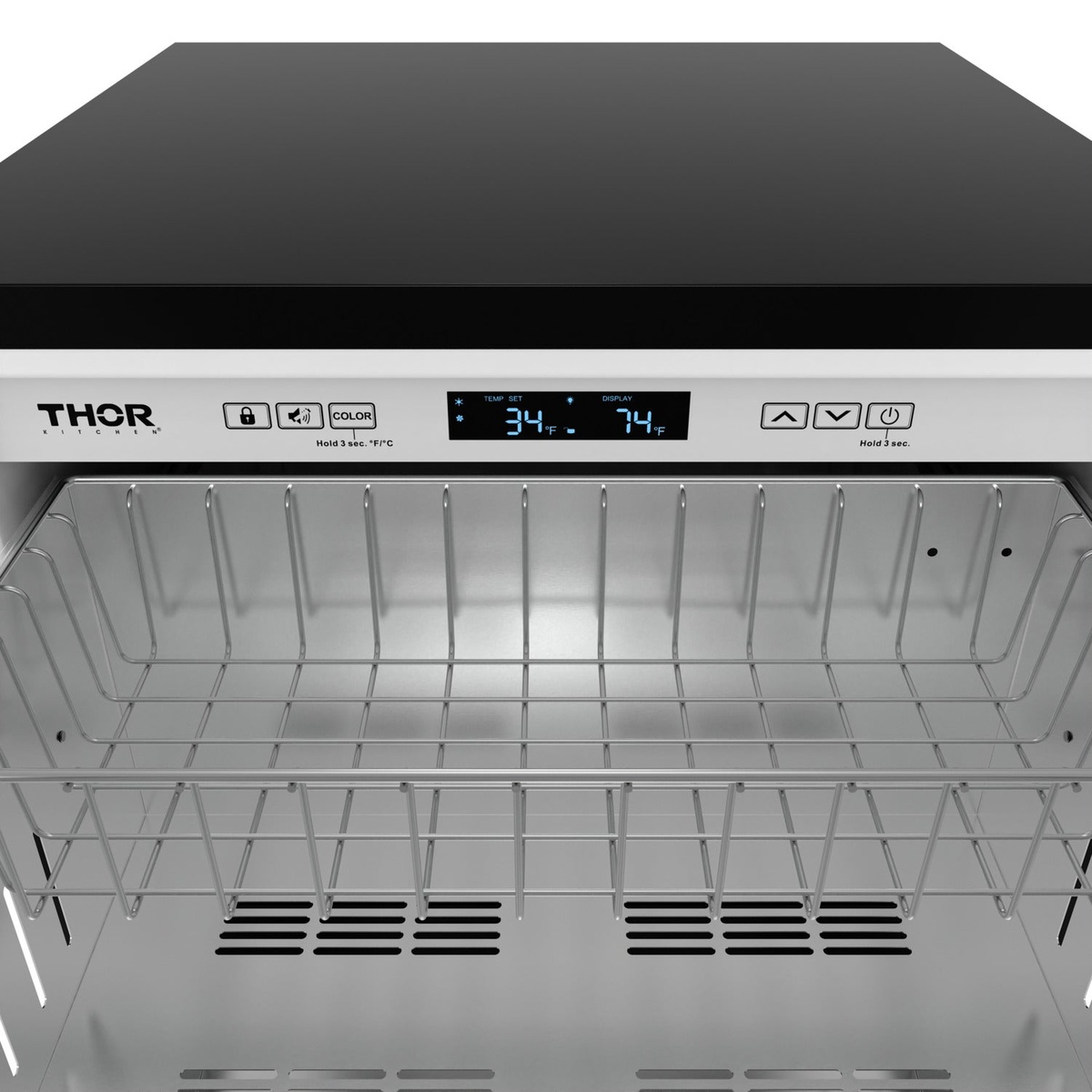 Thor Kitchen TRF24U front-facing digital control panel with blue LED display showing set temperature and ambient display, above open drawer with wire racks