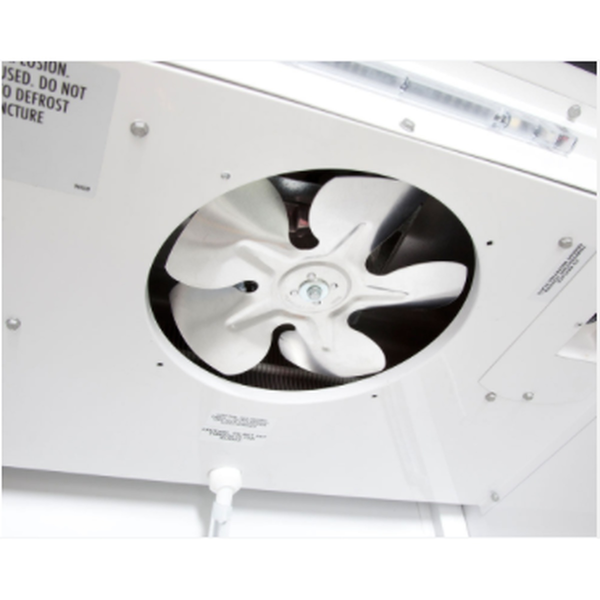 Interior evaporator fan assembly inside the True TSSU-72-18M-B-HC refrigerated prep table providing consistent airflow and temperature distribution
