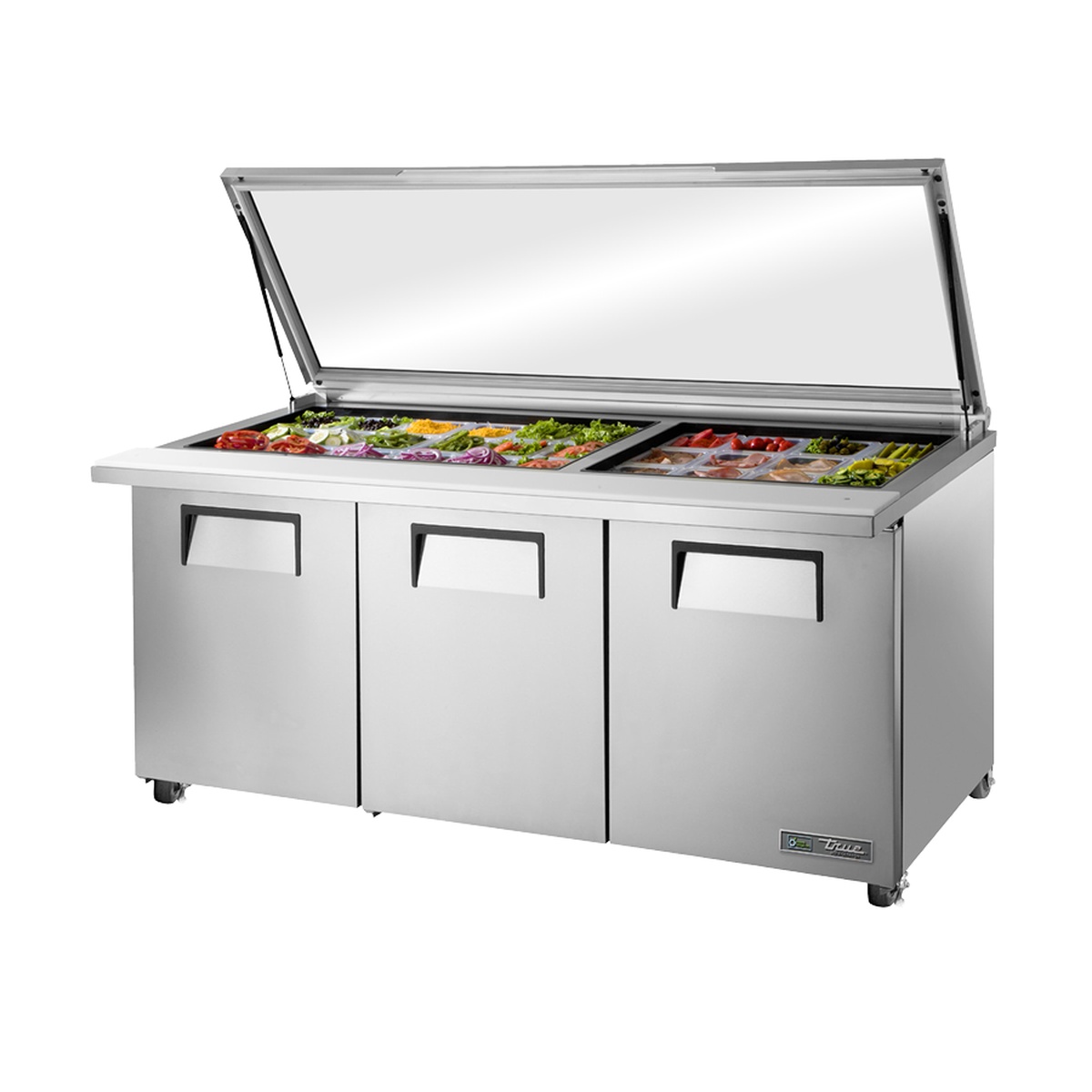 True TSSU-72-30M-B-ST-FGLID-HC 72-inch 3-door mega top sandwich salad prep table shown at an angle with flat glass lid open and food pans loaded with fresh ingredients