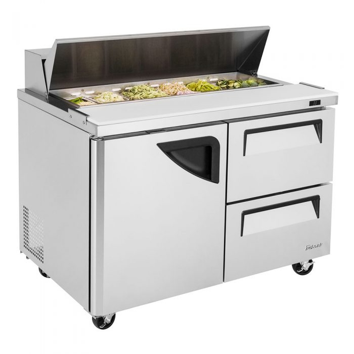 Angled view of Turbo Air 48 inch prep table with one door and two drawers