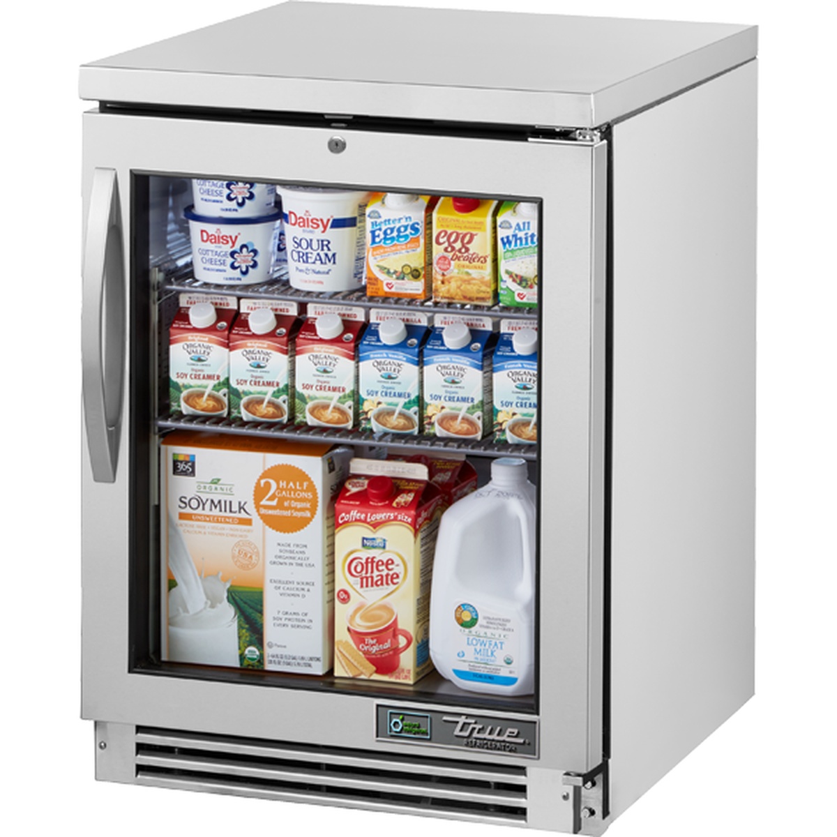 True TUC-24G-HC~FGD01 stainless steel undercounter refrigerator with framed glass door and two wire shelves stocked with dairy products