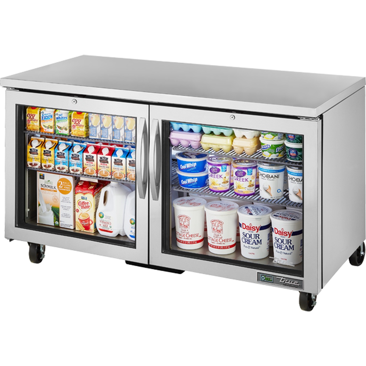 True TUC-60G-HC~FGD01 60-inch two-door undercounter refrigerator with framed glass doors and stainless steel top, stocked with dairy products