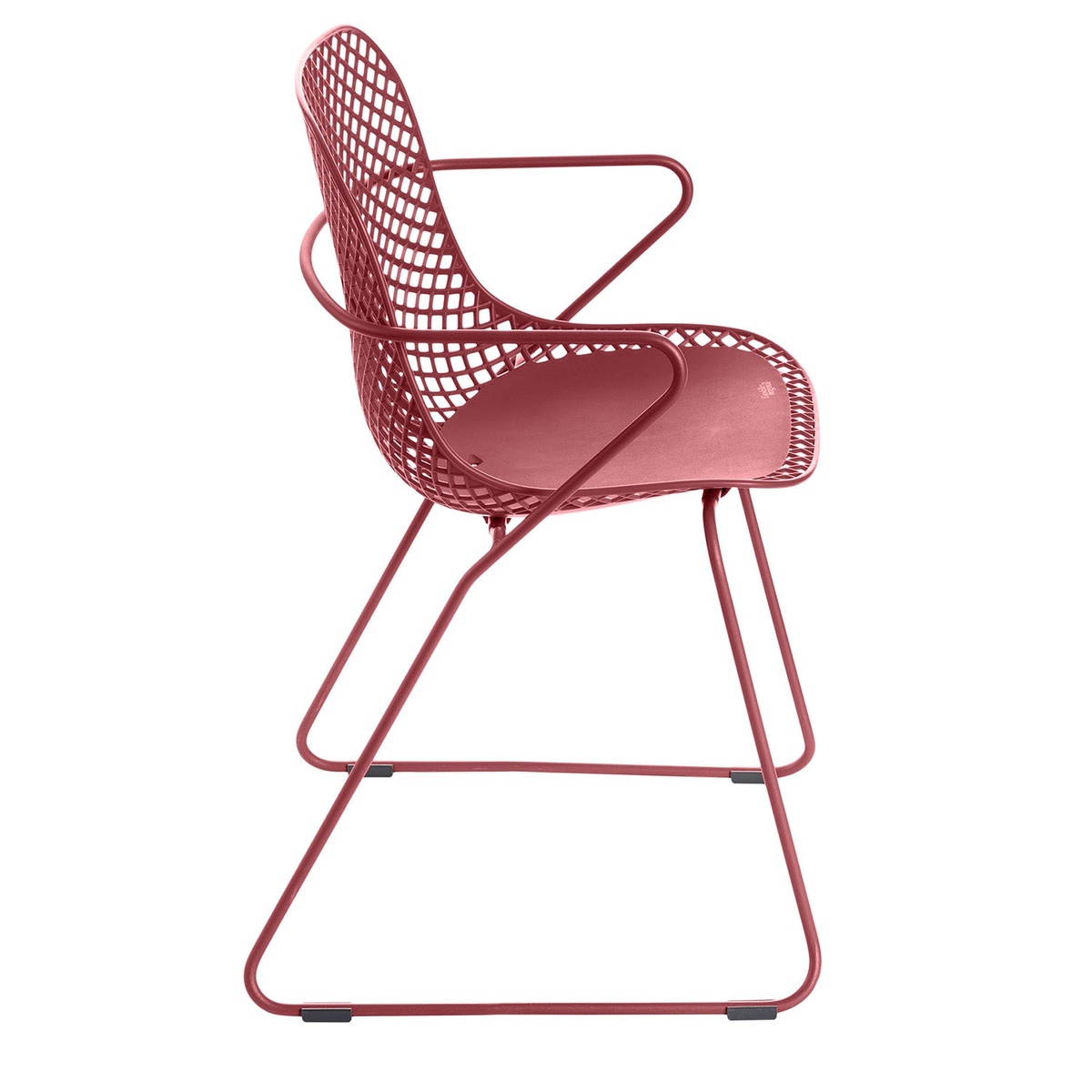 Side profile view of the Grosfillex Ramatuelle 73 Armchair in Rouge Bossa Nova showing sled base and seat depth