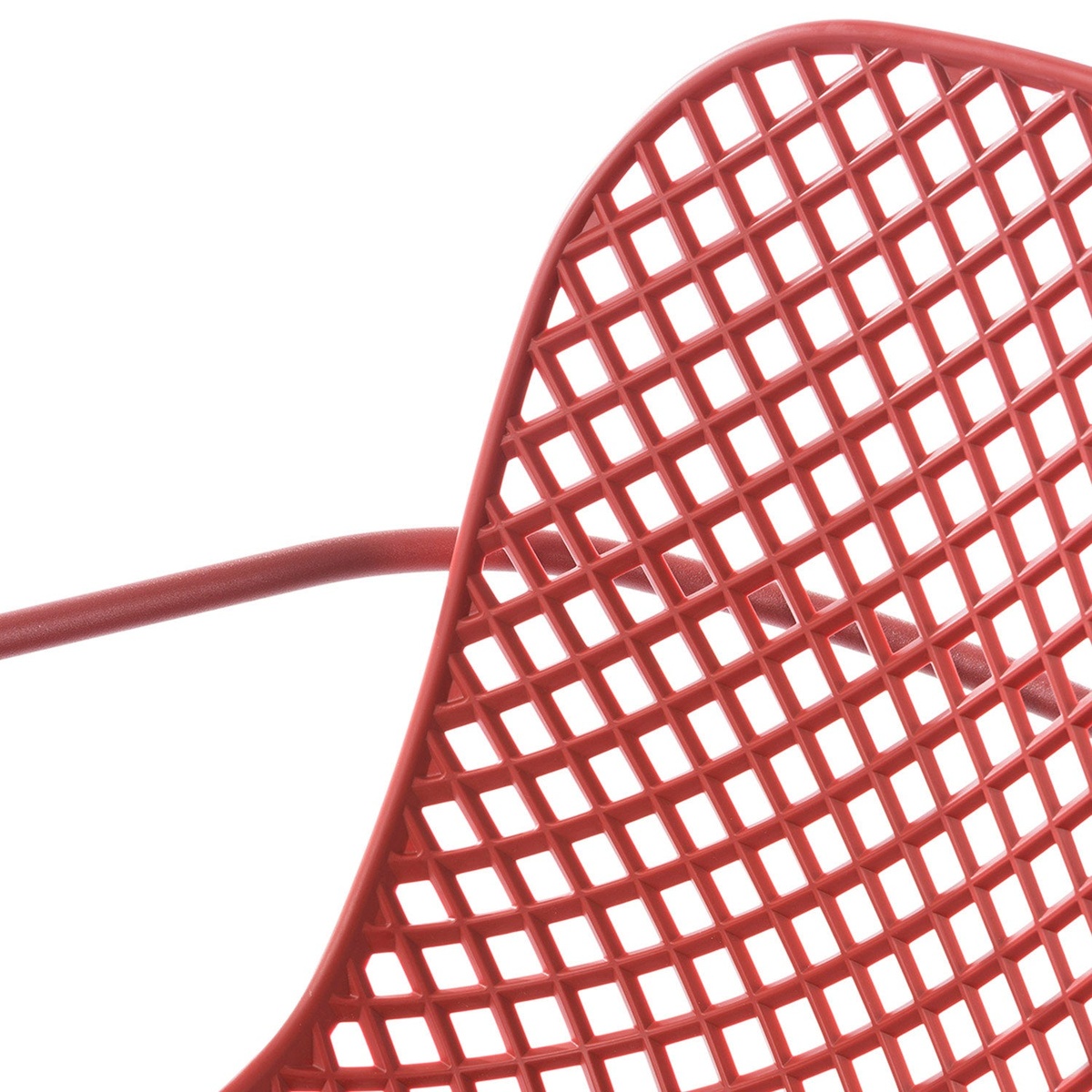 Close-up detail of the Grosfillex Ramatuelle 73 Armchair lattice back and armrest construction in Rouge Bossa Nova