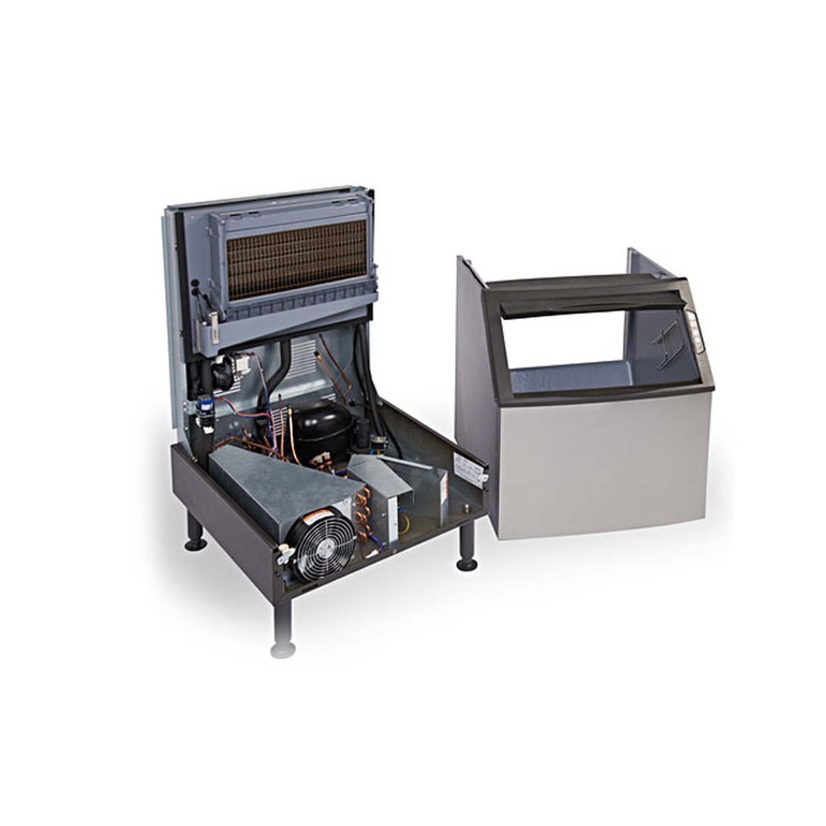 Manitowoc ice machine with bin removed showing internal components