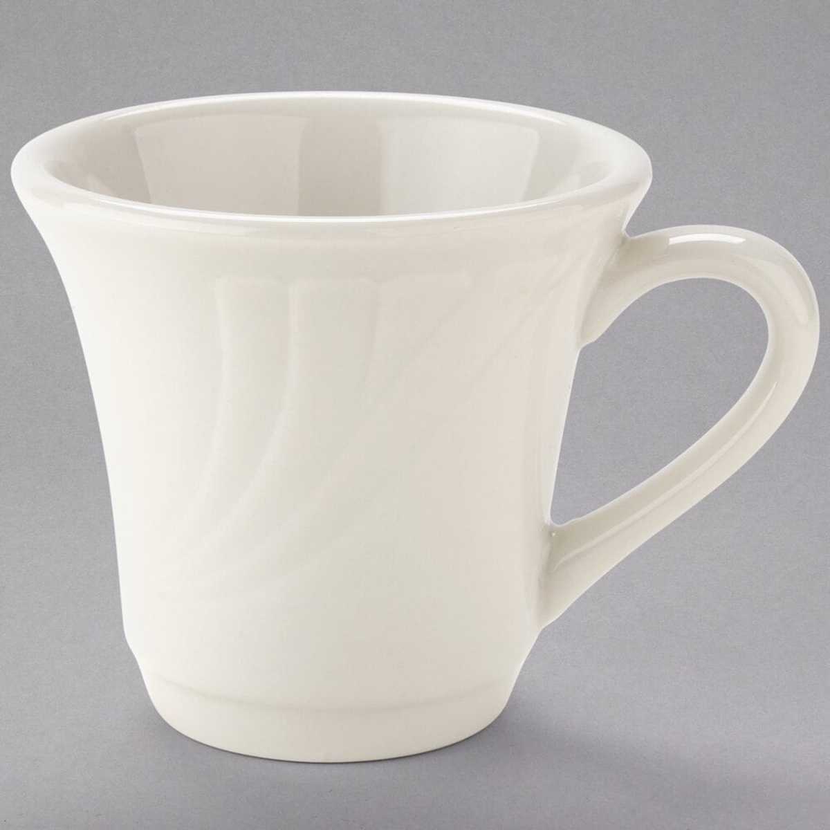 Tuxton YEF-070 Monterey 6 oz. eggshell embossed rim china tall cup with handle on gray background