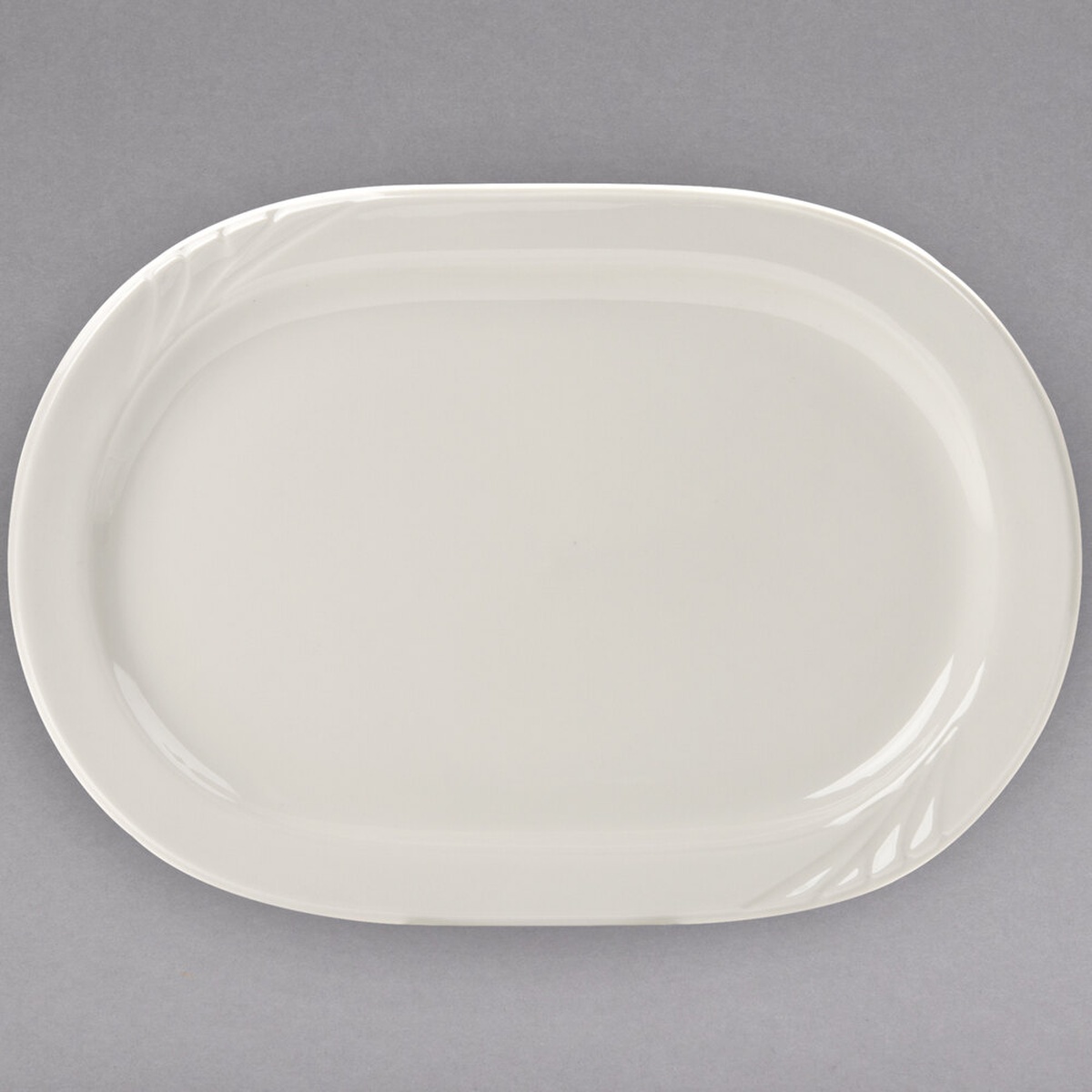 Tuxton YEH-137 Monterey 13 7/8 inch eggshell embossed rim china platter, top-down view