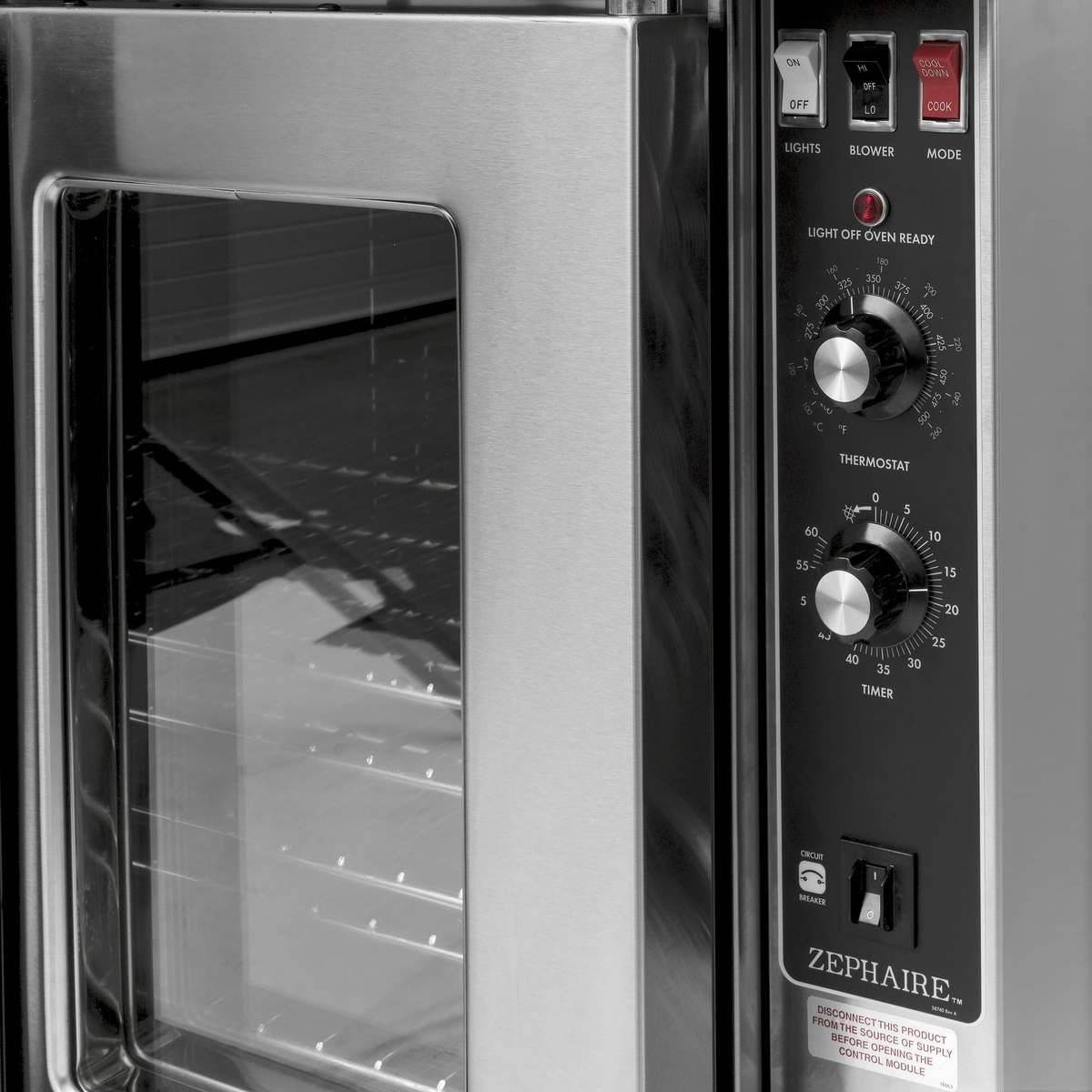Close-up of Zephaire oven manual control panel with thermostat and timer knobs