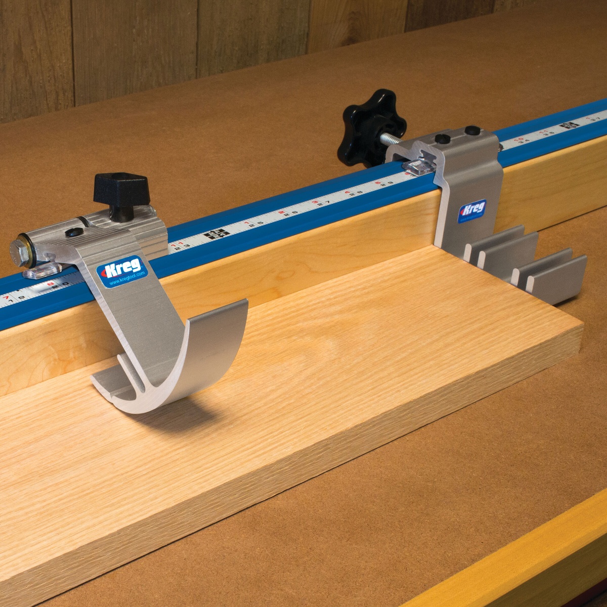 Kreg KMS8000 Precision Trak & Stop Kit set up on a shop fence for repeatable wood cutting on a miter saw station
