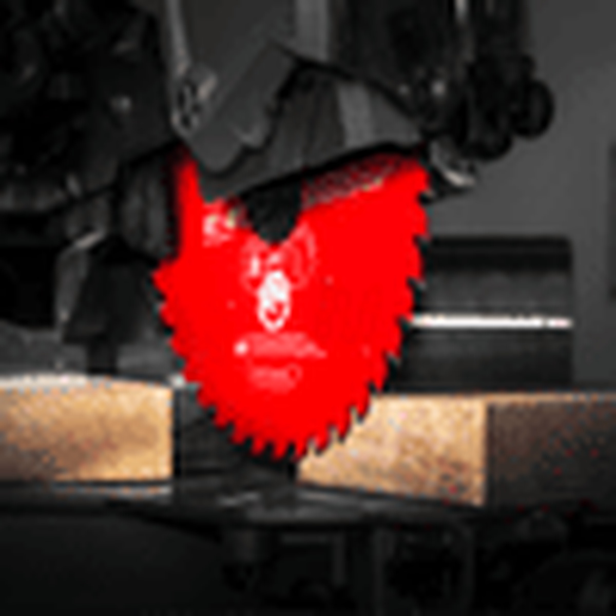 Freud P410 10 in. general purpose blade installed on a table saw making a clean wood cut in a workshop