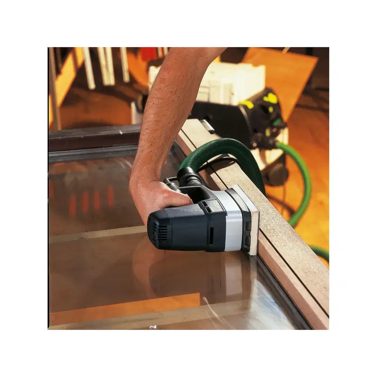 Festool 490161 Flat Sanding Pad used on a Festool LS 130 for controlled edge sanding on a wood frame in a workshop