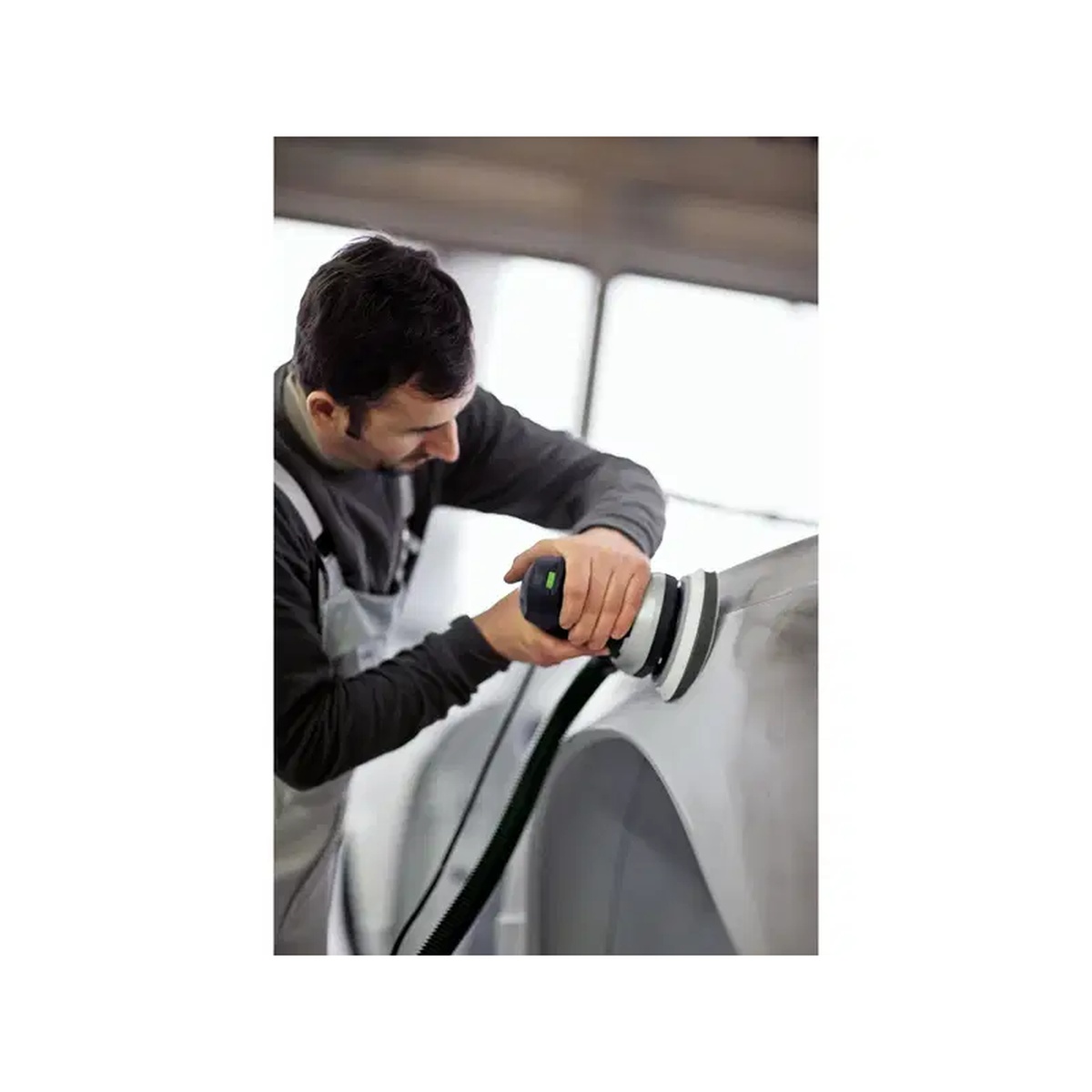 Festool 497481 Interface Pad for RO 90 DX in automotive finishing work with a 90 mm sander on a curved vehicle panel