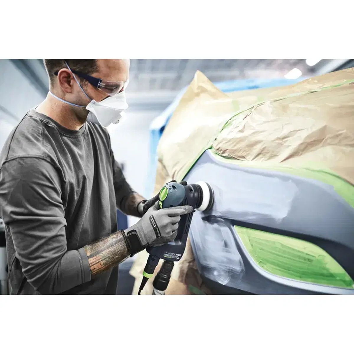 Festool 497481 Interface Pad for RO 90 DX used for contour sanding on an automotive body panel during fine surface preparation