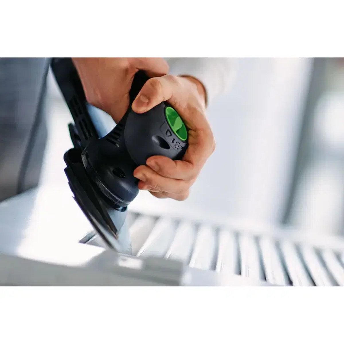 Festool 497483 Backing Pad for Extended Plate installed on an RO 90 detail sander sanding between narrow painted slats during finish work