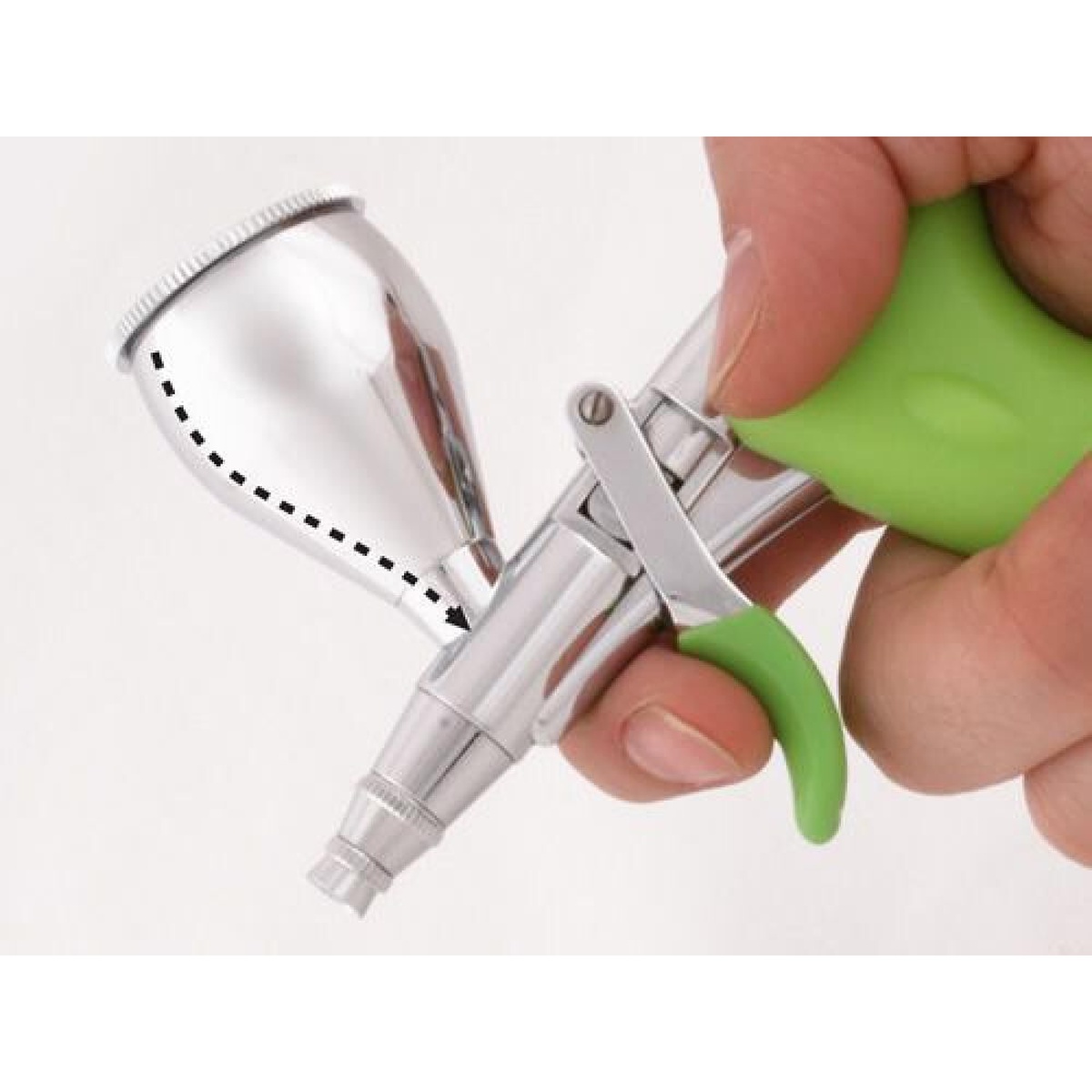 Grex Tritium.TG3 Double Action Pistol Style Trigger Airbrush in hand during fine paint application work with top gravity cup and pull trigger control