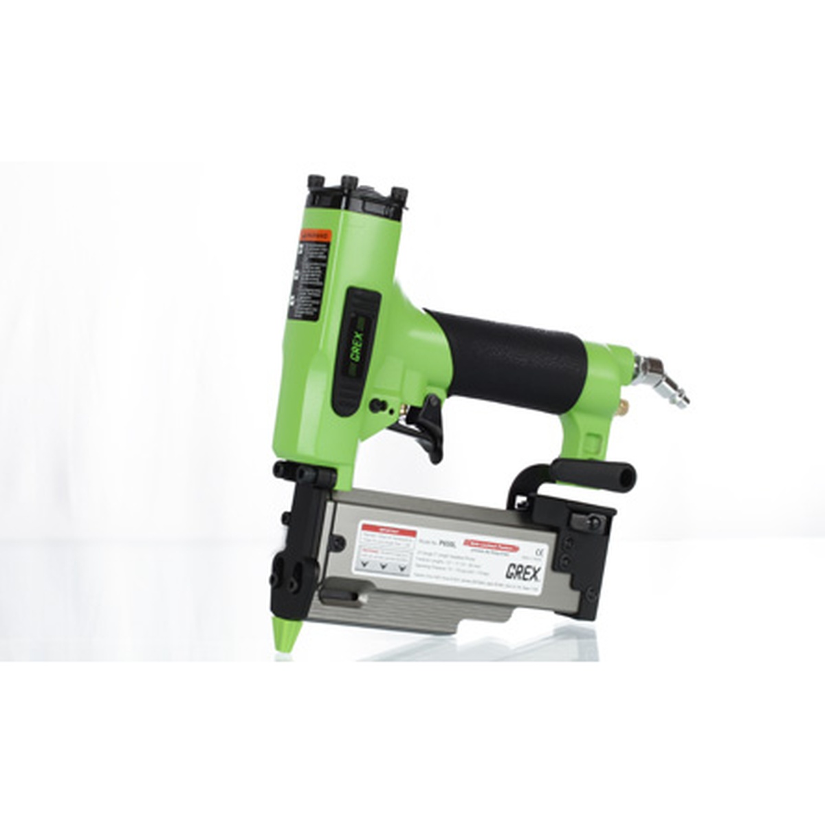 Grex P650L 23 Gauge Pin Nailer product view on a workbench, showing the compact headless pin fastening tool used for trim and woodworking tasks